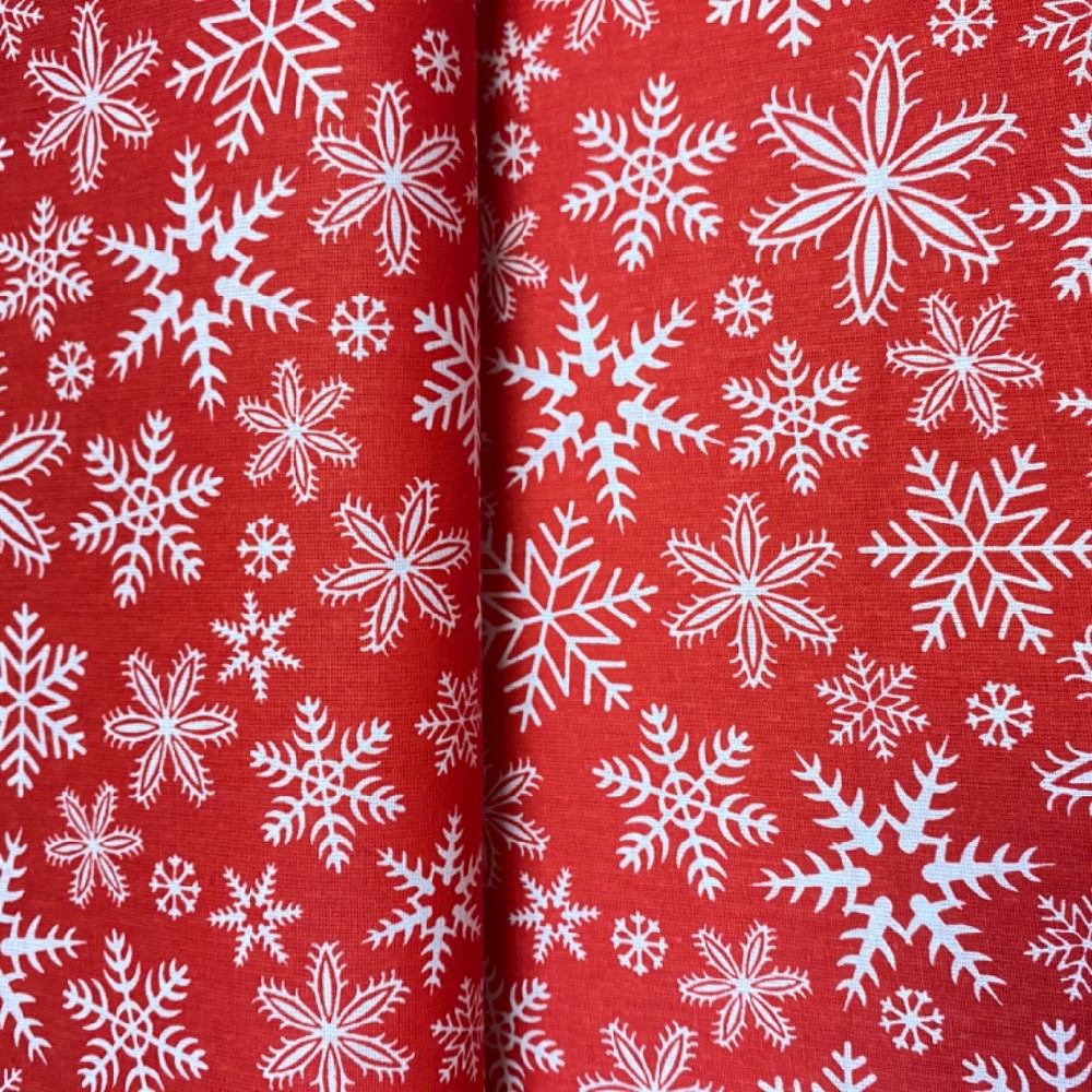 bavlna vánoční bílé vločky na červeném podkladě