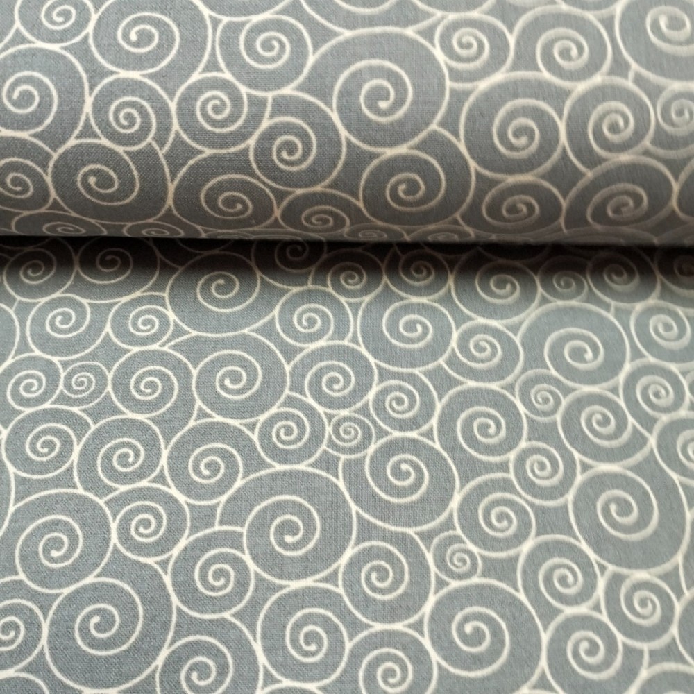 Bavlna béžové spirály na hnědém podkladu š.150.cm