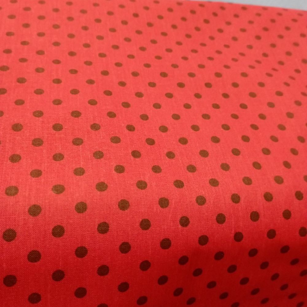 bavlna černo bílý puntík na červeném podkladě 140 cm