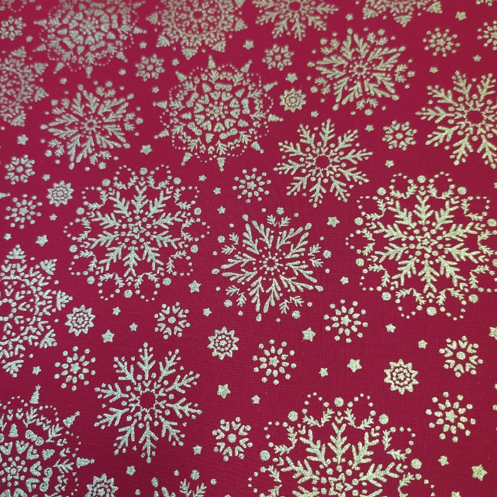 bavlna vánoce zlaté vločky na červené š.148cm 100%ba