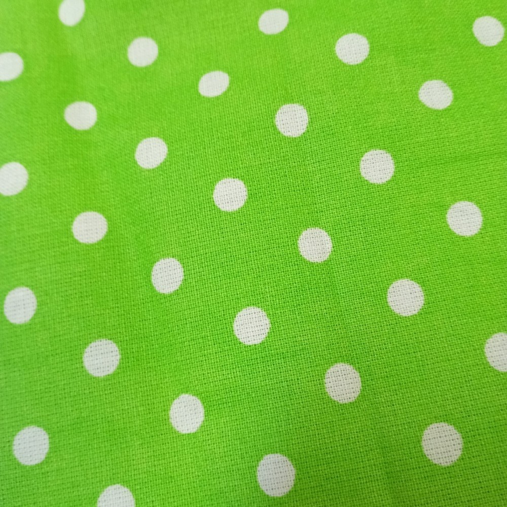 bavlna bíllý puntík  na zeleném podkladě 160 cm